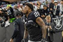 Raiders running back Josh Jacobs (28) takes the field before an NFL game against the San Franci ...