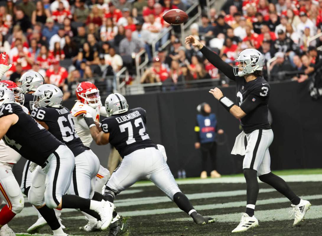 Raiders quarterback Jarrett Stidham (3) throws a pass during the first half an NFL game against ...