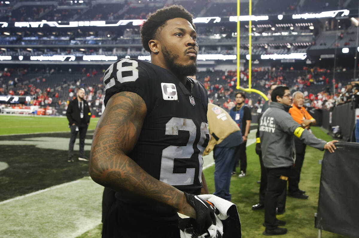 Raiders running back Josh Jacobs leaves the field after a loss to the Kansas City Chiefs in an ...