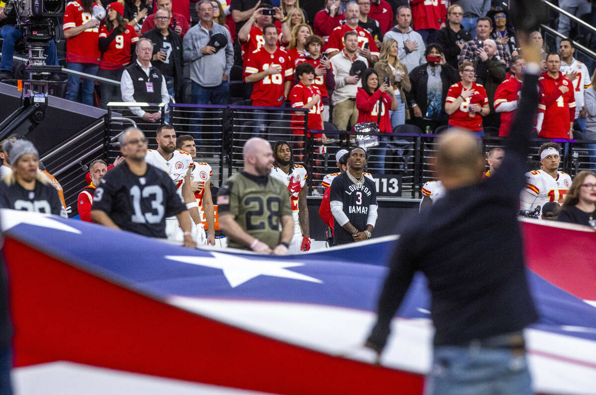 Kansas City Chiefs players show their support for injured player Damar Hamlin during the Nation ...