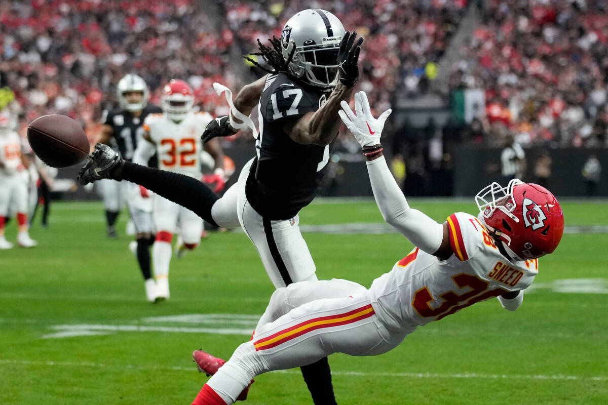 Las Vegas Raiders wide receiver Davante Adams (17) is unable to catch a pass as Kansas City Chi ...