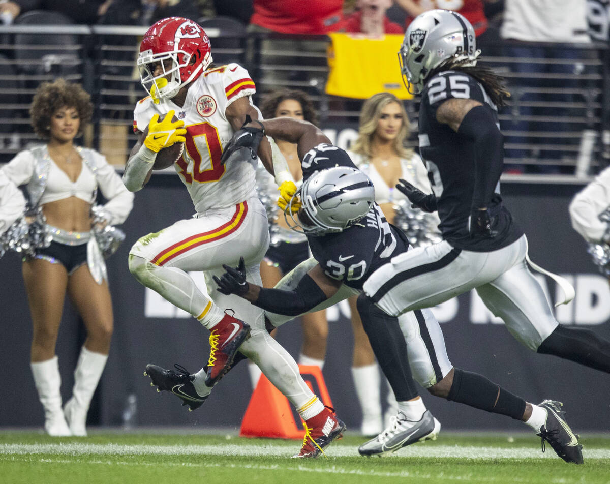 Raiders safety Duron Harmon (30) attempts to tackle Kansas City Chiefs running back Isiah Pache ...