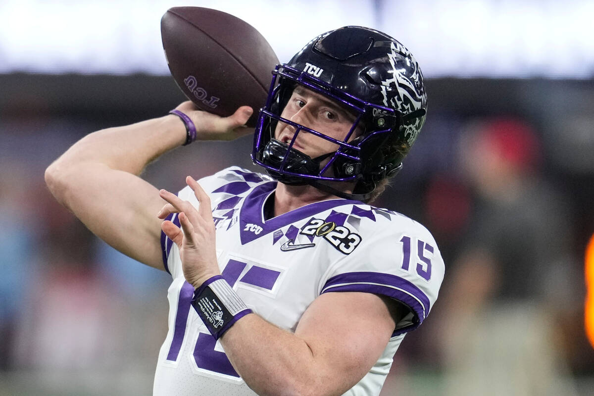 TCU quarterback Max Duggan (15) warms up before the national championship NCAA College Football ...