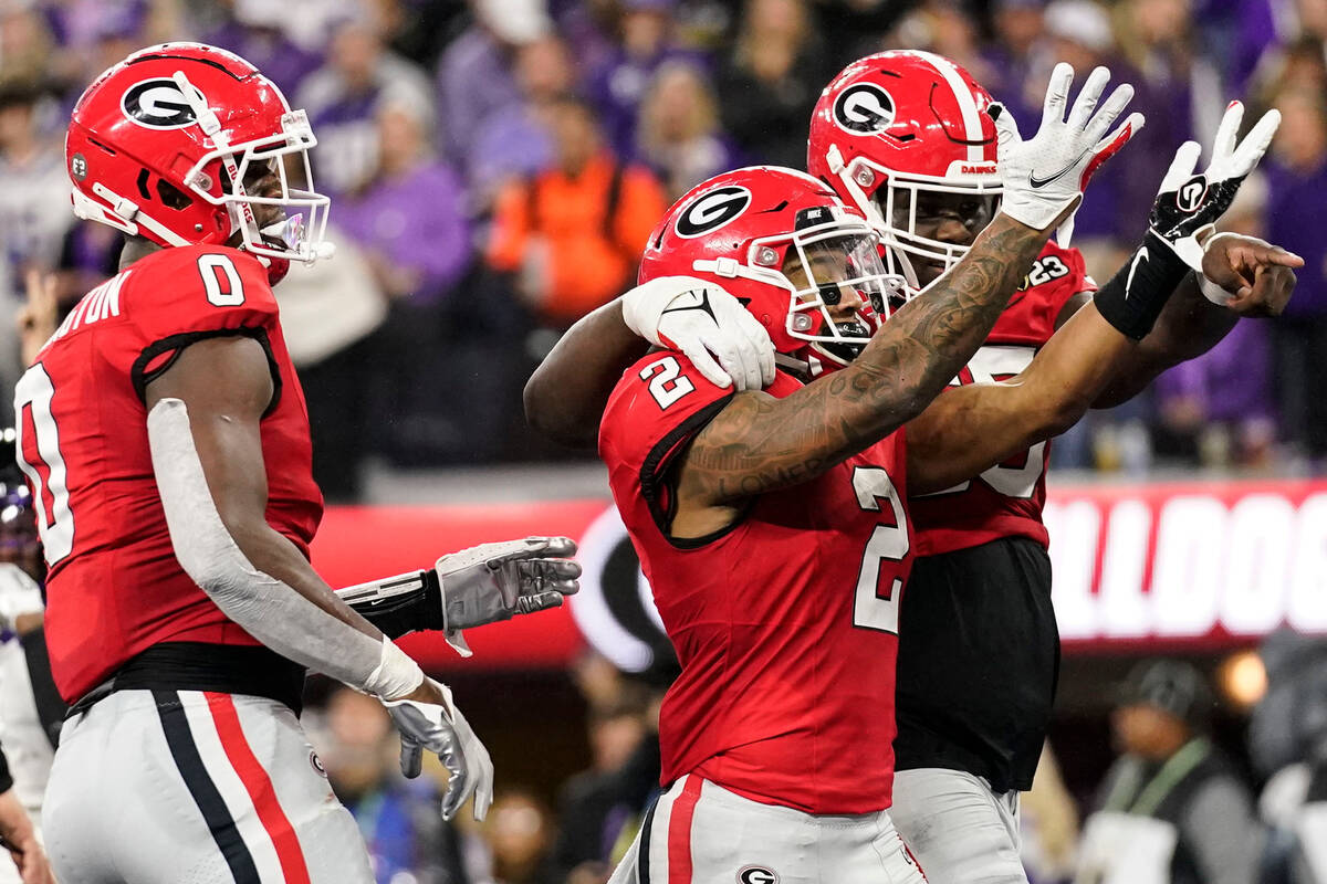 Georgia running back Kendall Milton (2) celebrates his touchdown against TCU during the first h ...