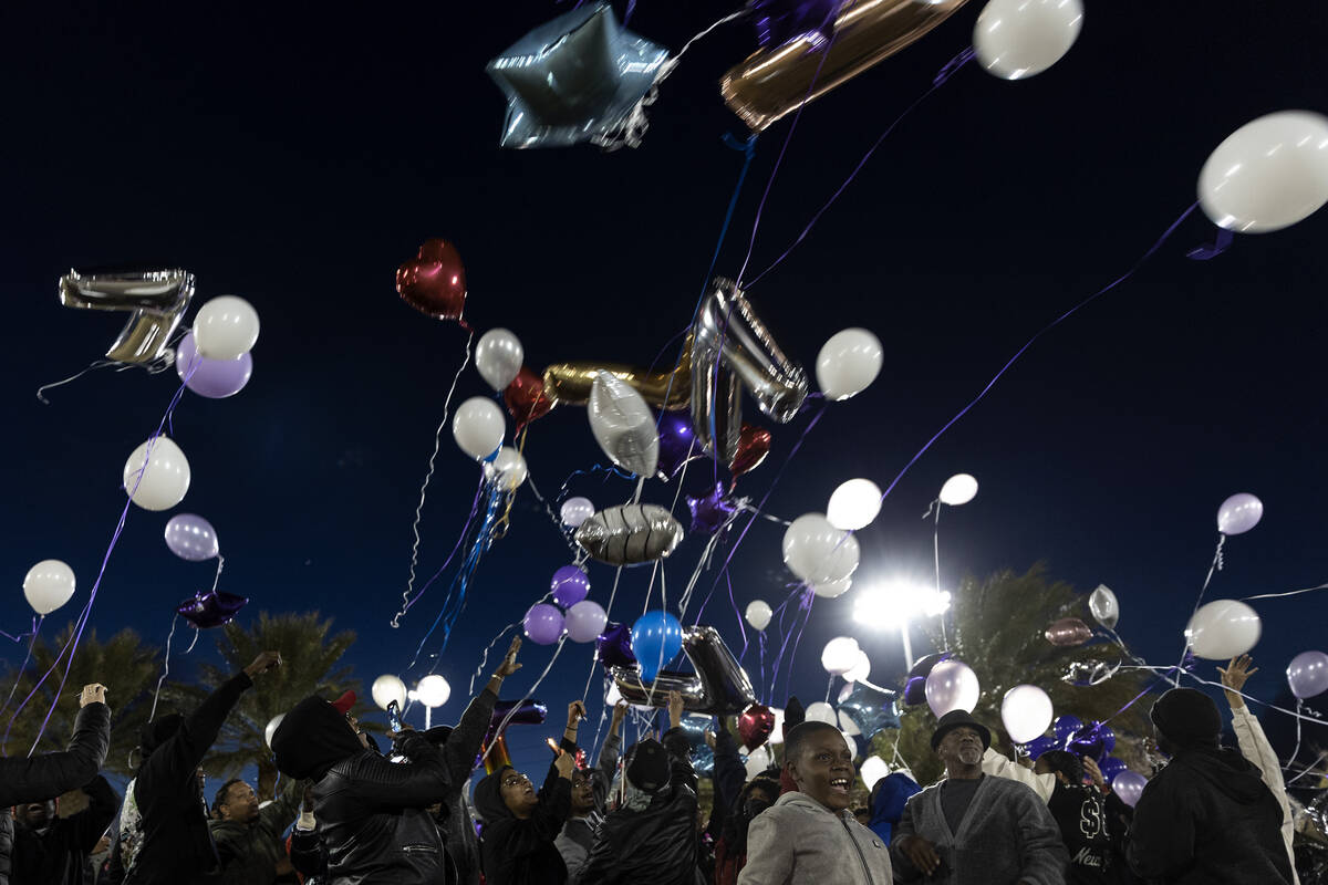 Loved ones of Ashari Hughes release balloons in her honor outside Doolittle Community Center on ...