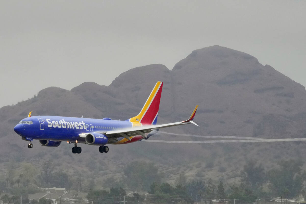 FILE - A Southwest Airlines jet arrives at Sky Harbor International Airport, Dec. 28, 2022, in ...