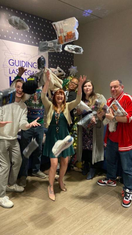 Coldwell Banker Premier Realty collected 3,846 pairs of socks for the Nevada Partnership of Hom ...