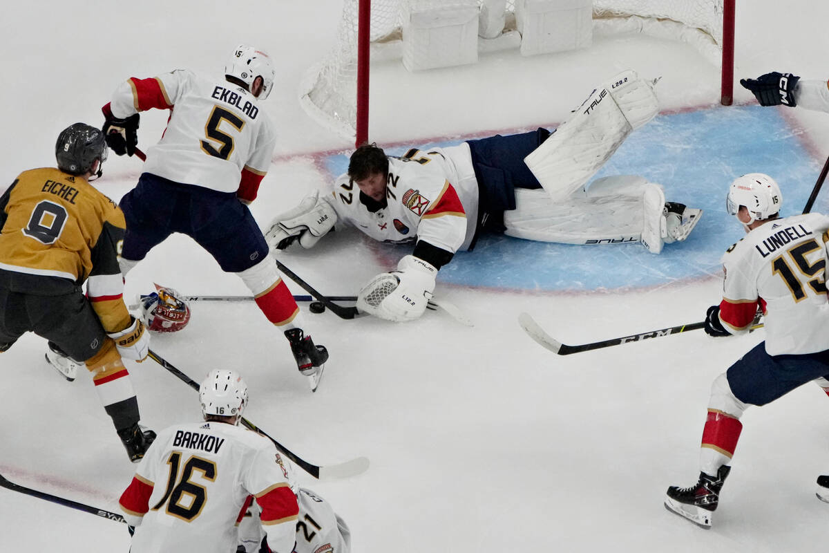 Florida Panthers goaltender Sergei Bobrovsky (72) attempts to cover the puck against the Vegas ...