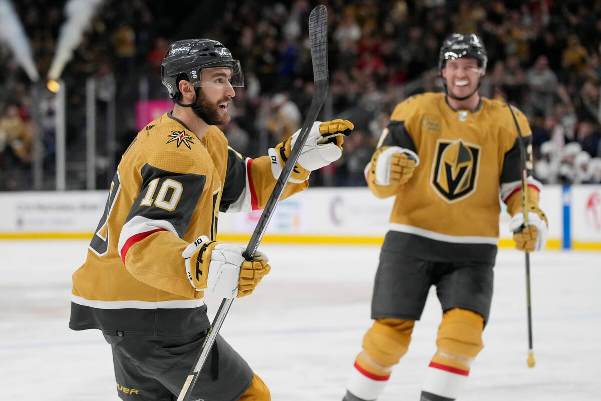 Vegas Golden Knights center Nicolas Roy (10) celebrates after scoring against the Vegas Golden ...