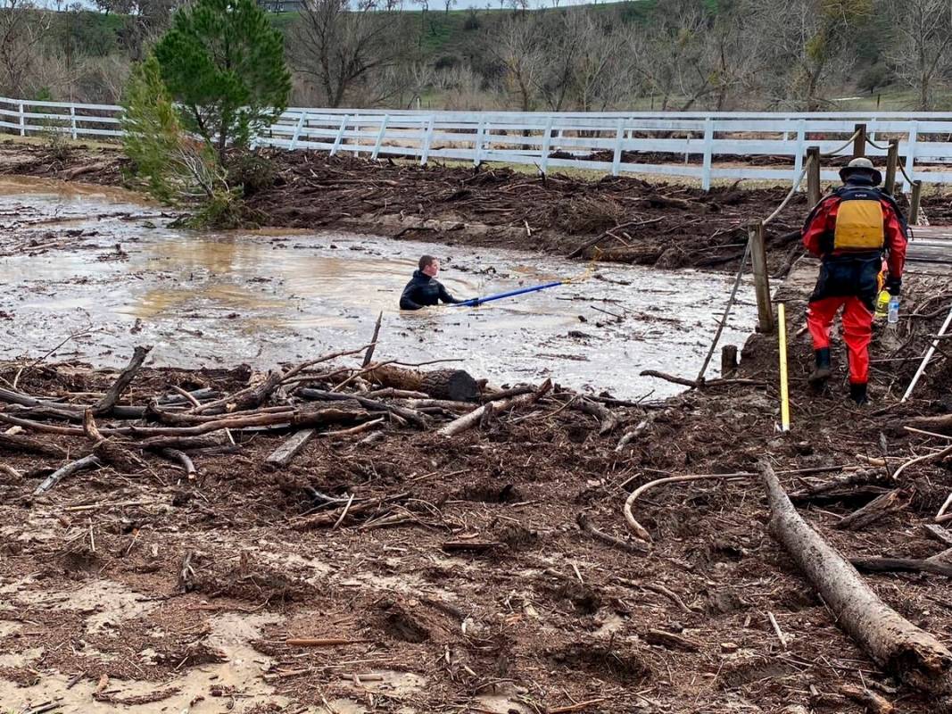 In this photo provided by San Luis Obispo County Sheriff's Office, rescuers resume their search ...