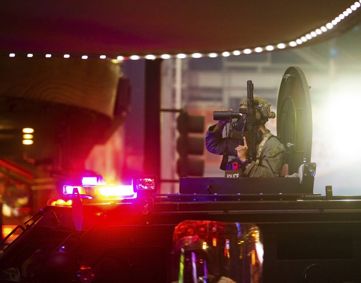 Police patrol Fremont Street during a protest organized by Black Lives Matter in downtown Las V ...