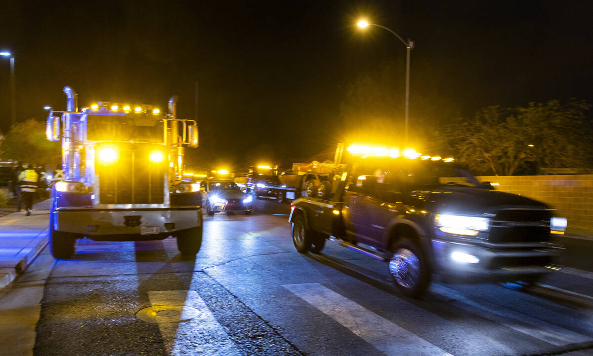 Numerous tow trucks line the road as family and friends of Jonet Dominguez honor him during a c ...