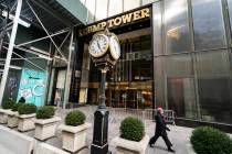 Pedestrians pass security barricades in front of Trump Tower, Wednesday, Feb. 17, 2021, in New ...