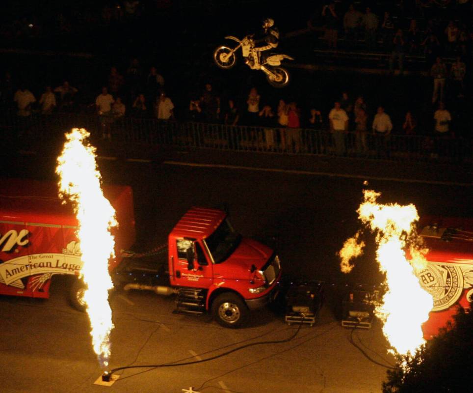 Motorcycle daredevil Robbie Knievel successfully jumps his cycle for more than 125 feet at the ...