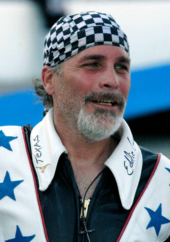 Robbie Knievel appears after his motorcycle jump before the start of the IRL Firestone 550 auto ...