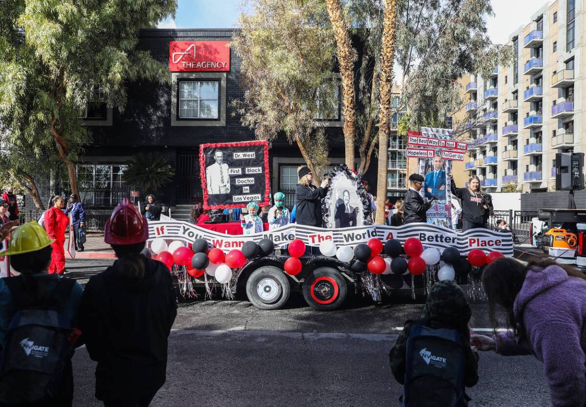 A float passes parade goers in the 41st annual Martin Luther King Jr. parade in downtown Las Ve ...