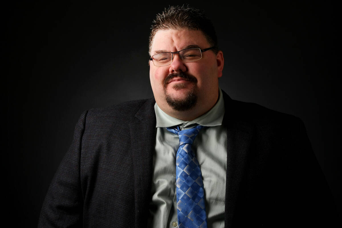 Adam Hill, reporter, poses for a portrait at the Las Vegas Review-Journal photos studio, Las Ve ...