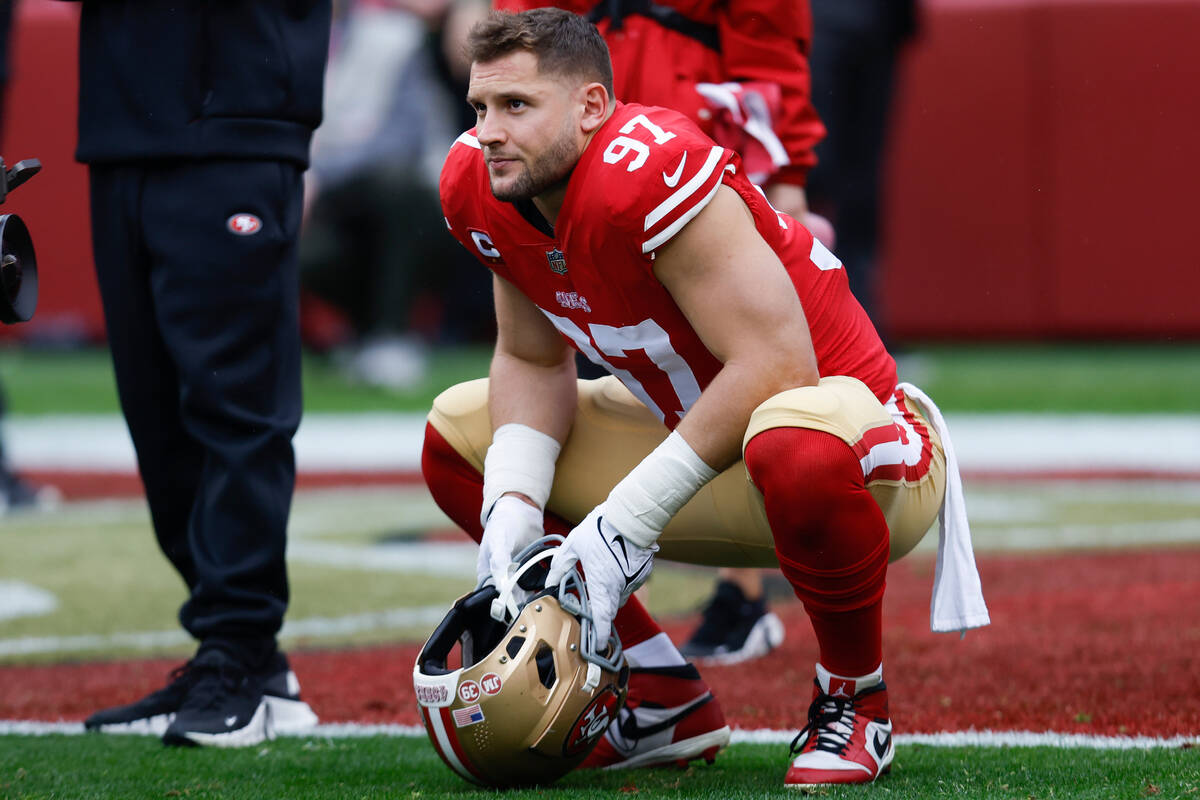 San Francisco 49ers defensive end Nick Bosa (97) warms up before an NFL wild card playoff footb ...