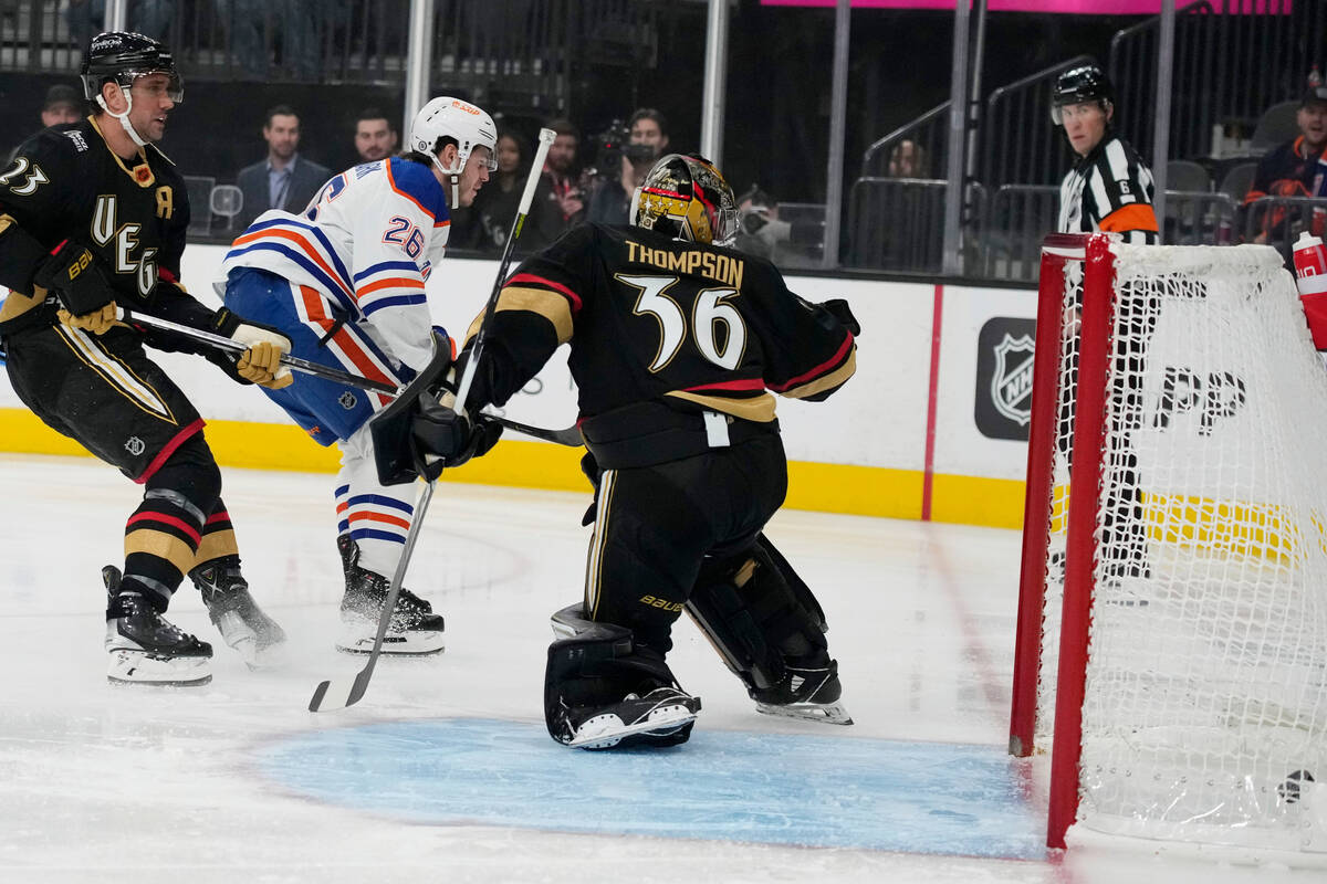 Edmonton Oilers center Mattias Janmark (26) scores on Vegas Golden Knights goaltender Logan Tho ...