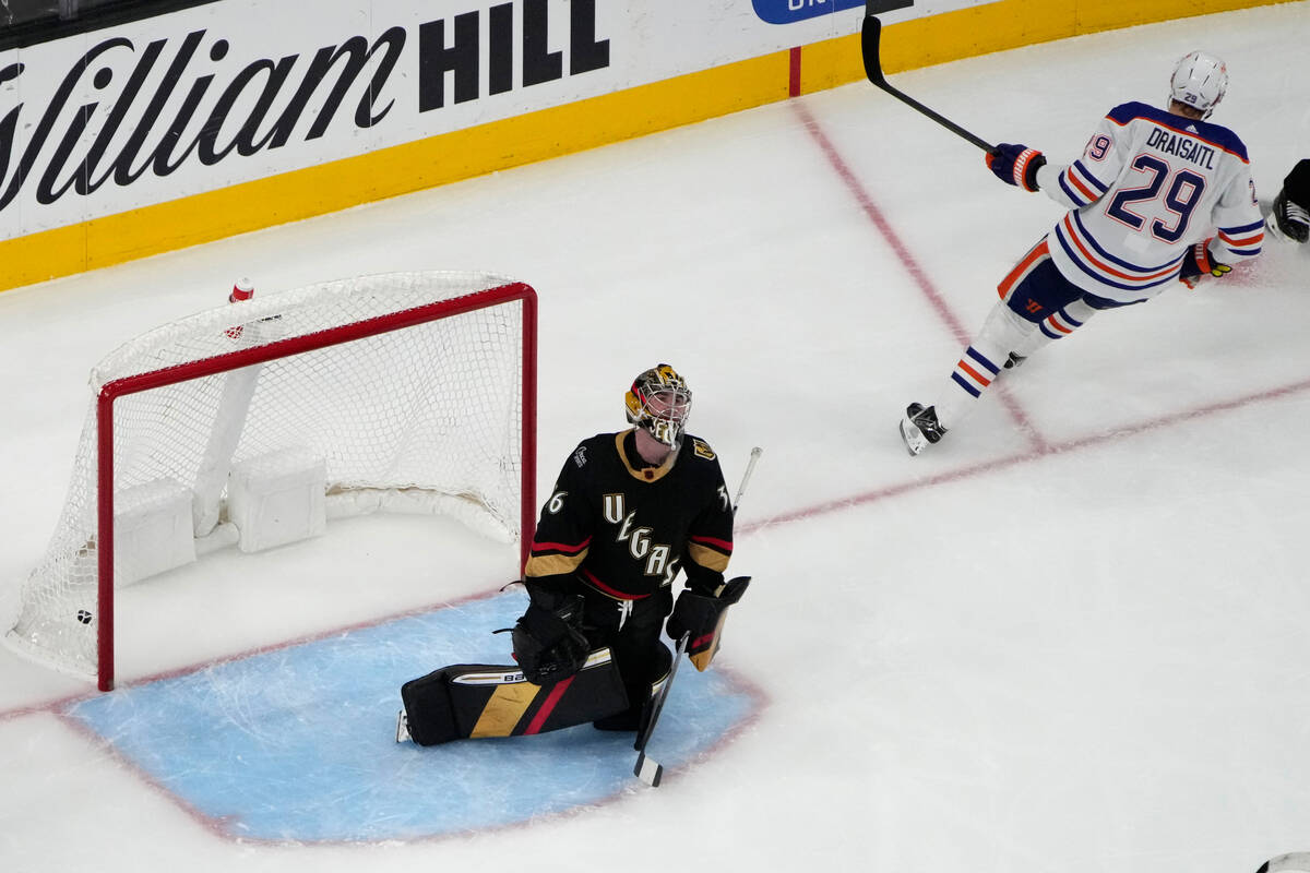 Edmonton Oilers center Leon Draisaitl (29) scores on Vegas Golden Knights goaltender Logan Thom ...