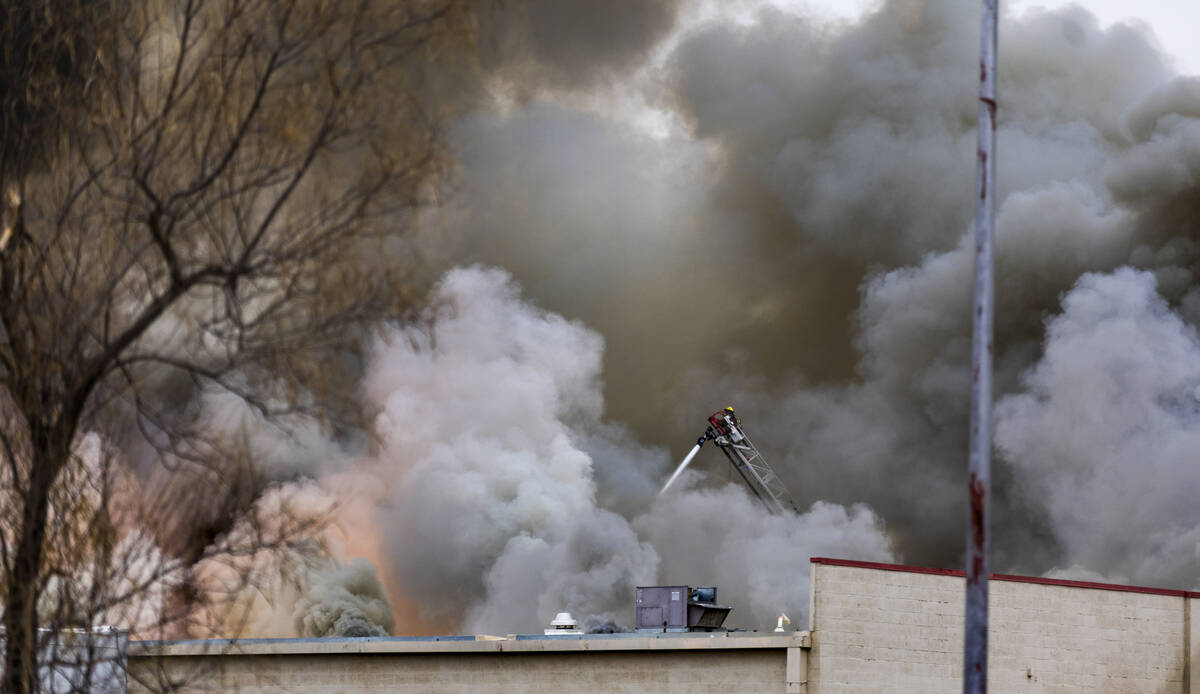 Las Vegas and Clark County Fire works a fully involved former Kmart store at 2975 E. Sahara Ave ...