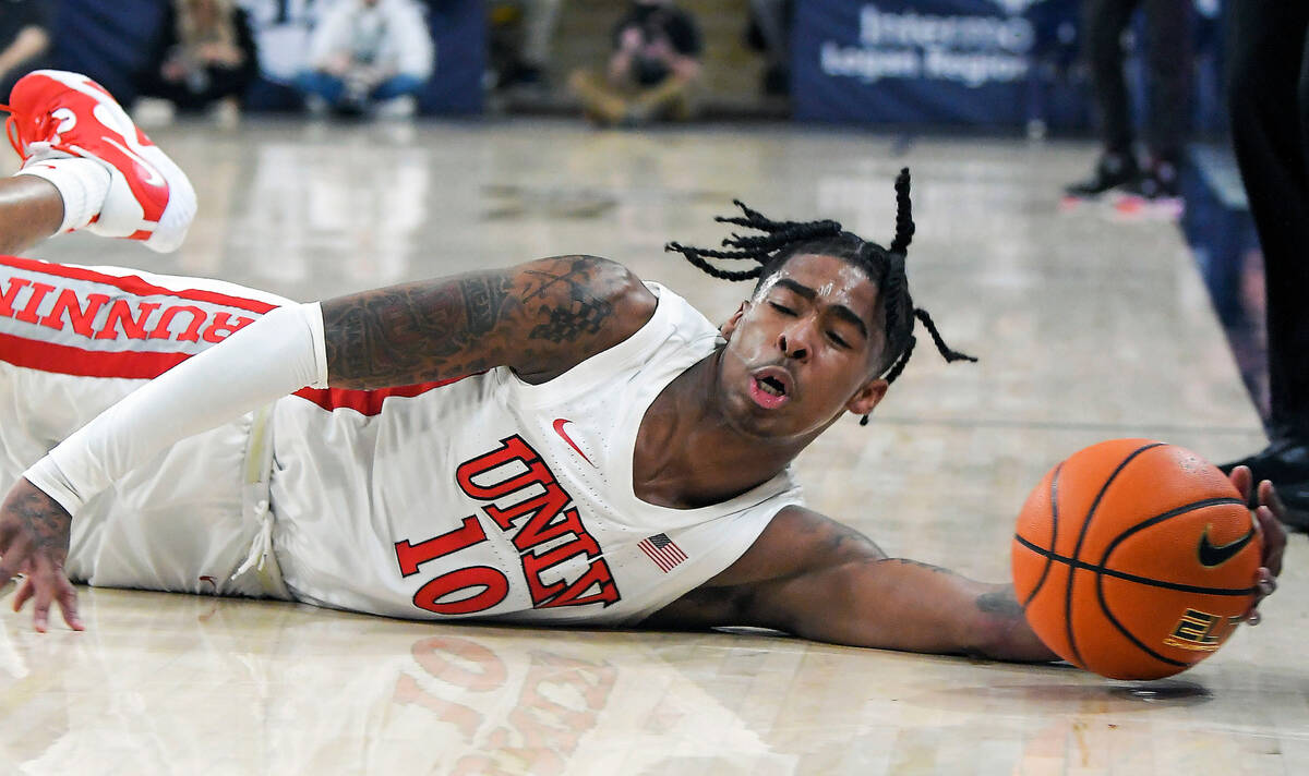 UNLV guard Keshon Gilbert (10) saves the ball from going out of bounds during the first half of ...