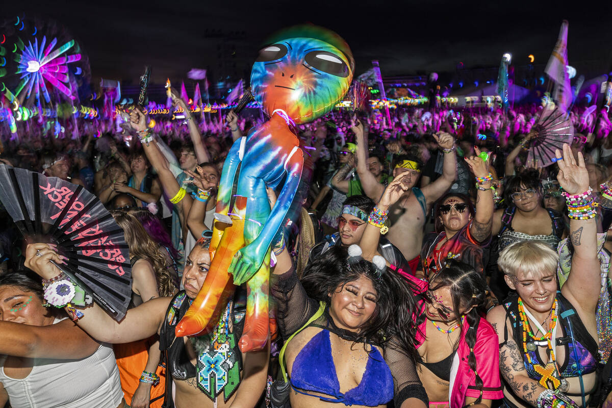 Attendees listen to music at Base Pod during day three of Electric Daisy Carnival on Sunday, Ma ...