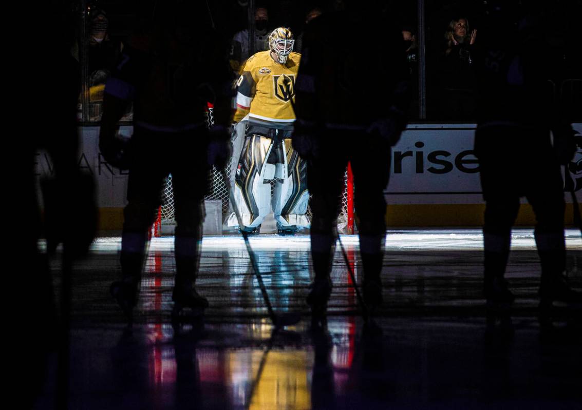 Golden Knights goaltender Robin Lehner (90) is announced before the start of an NHL hockey game ...