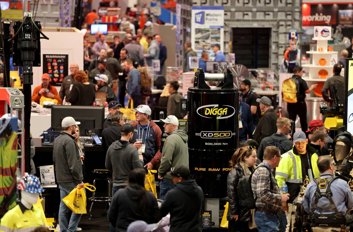 Conventioneers walk the show floor on Day 1 of World of Concrete at the Las Vegas Convention Ce ...