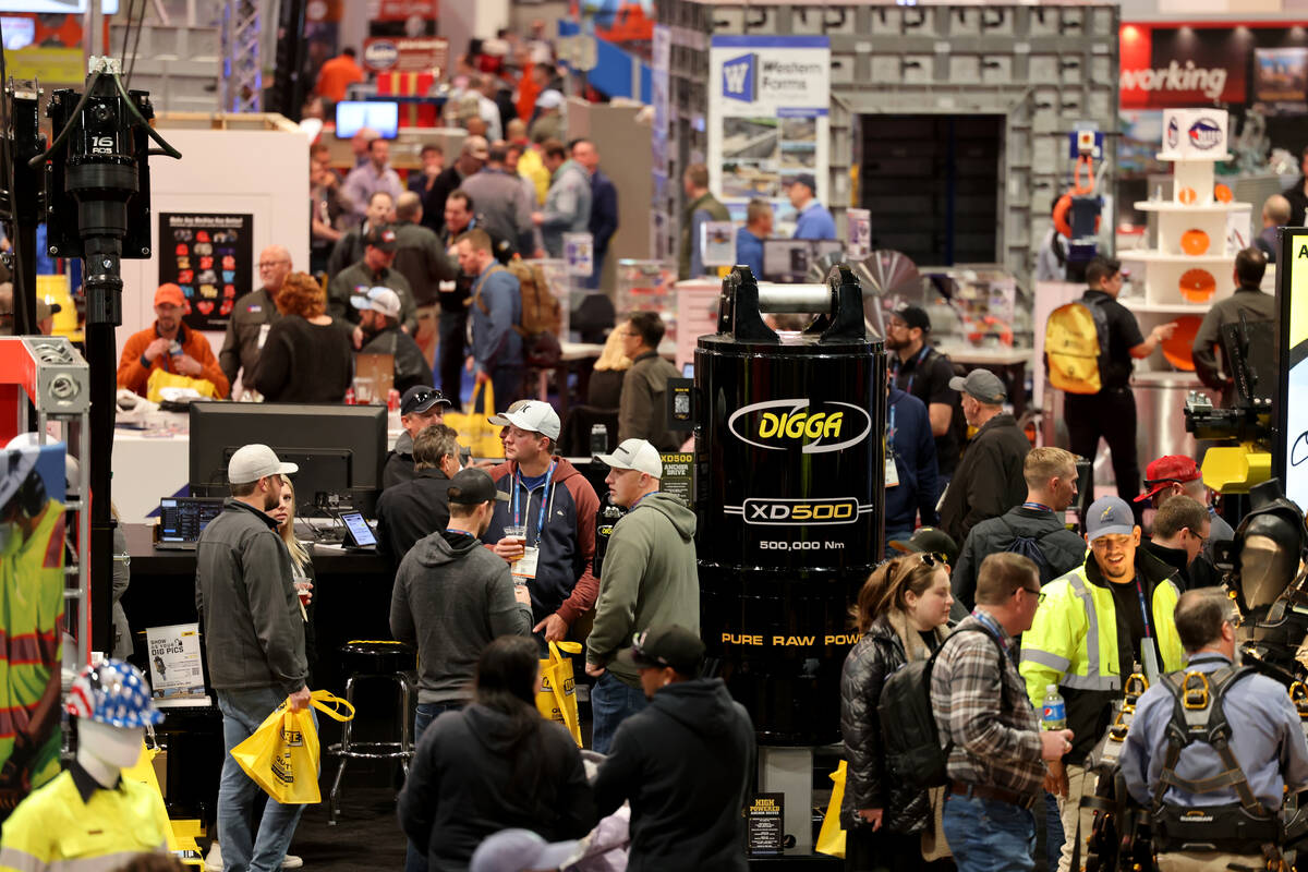 Conventioneers walk the show floor on Day 1 of World of Concrete at the Las Vegas Convention Ce ...