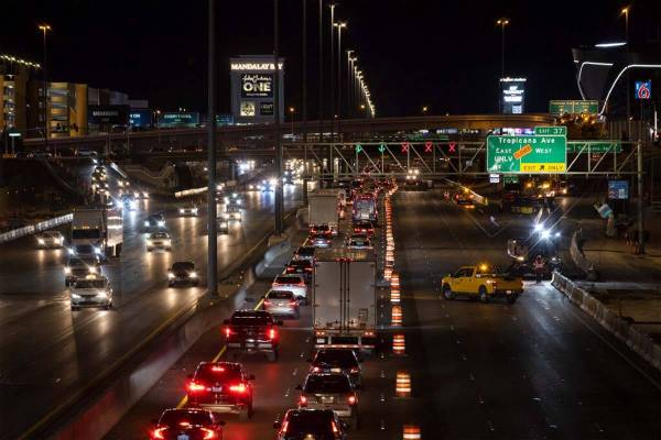 Traffic is reduced to two lanes on northbound I-15 as the Tropicana Avenue bridge exits are clo ...