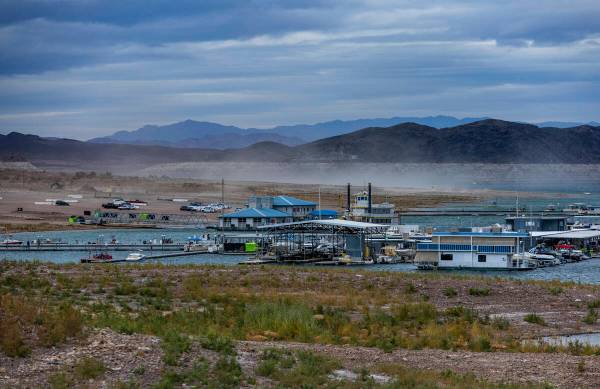 Dust is kicked up from a bulldozer with Las Vegas Boat Harbor at the Lake Mead National Recreat ...