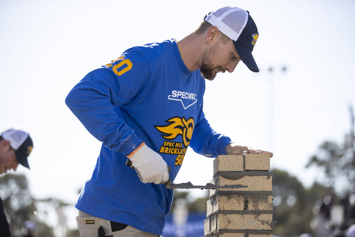 Dakota Bezemer participates in the World of Concrete Convention bricklaying competition at the ...