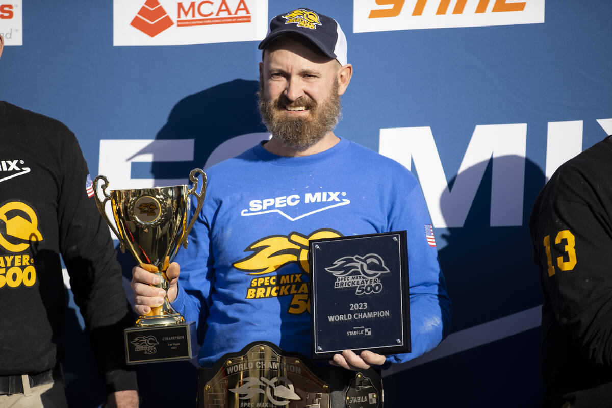 Michael Schlund poses after being announced the world champion in the World of Concrete Convent ...