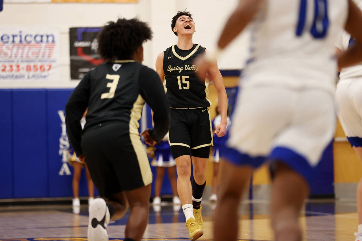 Spring Valley's Osvaldo Biebrich (15) reacts after scoring a 3-point-shot against Sierra Vista ...