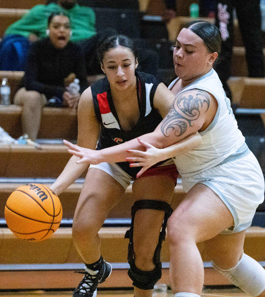 Liberty High's Jaden Newman (3) drives past Green Valley's Saedy Cozo (44) during the second ha ...