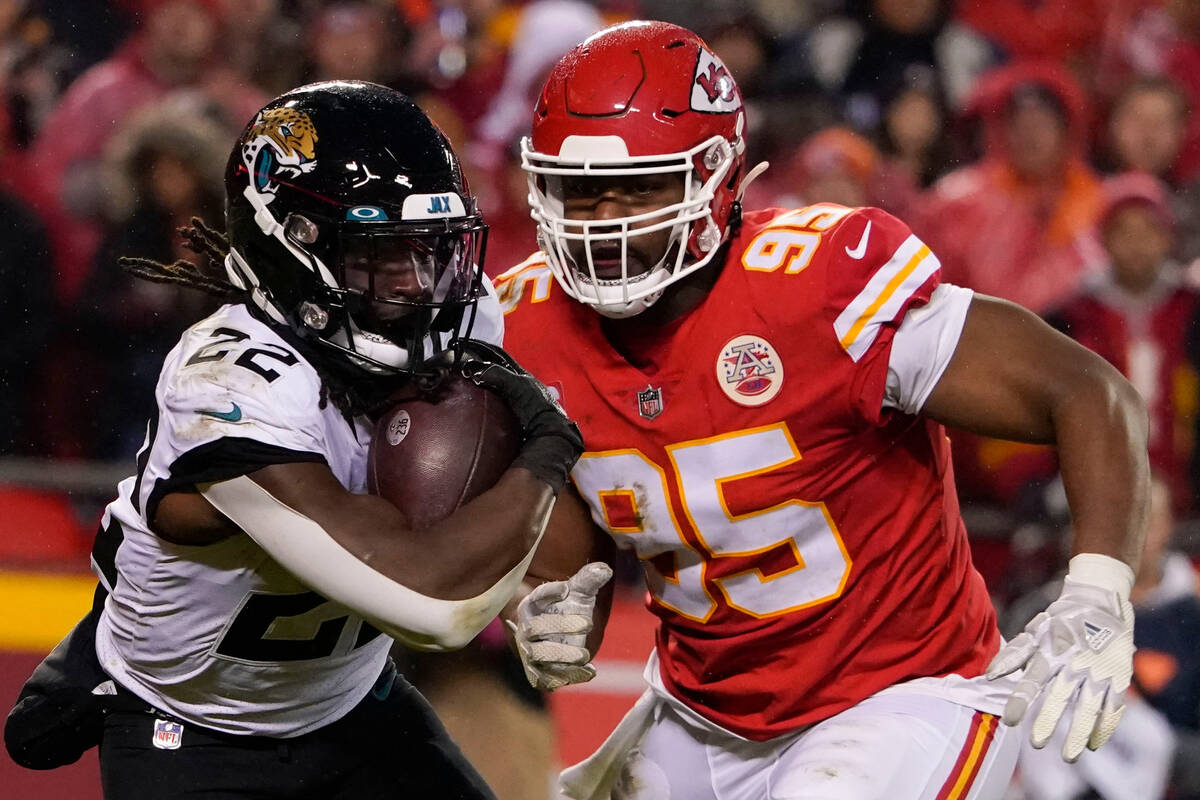 Jacksonville Jaguars running back JaMycal Hasty (22) runs against Kansas City Chiefs defensive ...