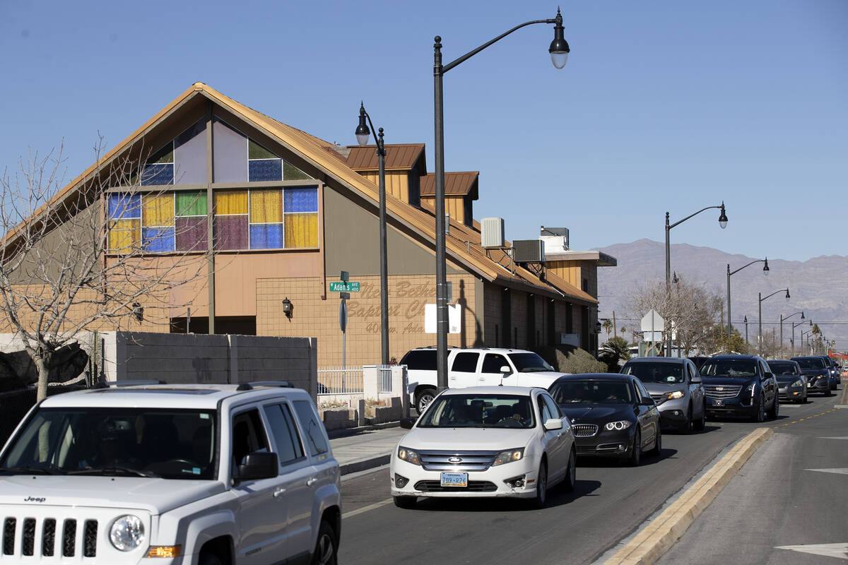 The funeral procession for Ashari Hughes makes way to her burial after a memorial at New Bethel ...