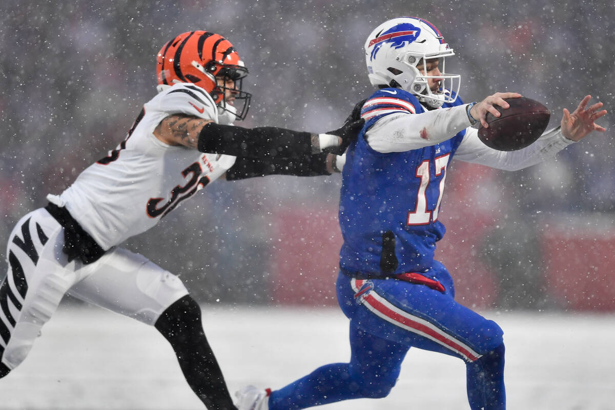 Cincinnati Bengals safety Jessie Bates III (30) chases down Buffalo Bills quarterback Josh Alle ...