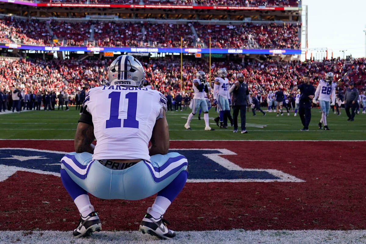 Dallas Cowboys linebacker Micah Parsons (11) warms up before an NFL divisional playoff football ...