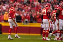 Kansas City Chiefs quarterback Patrick Mahomes (15) limps back to the huddle against the Jackso ...