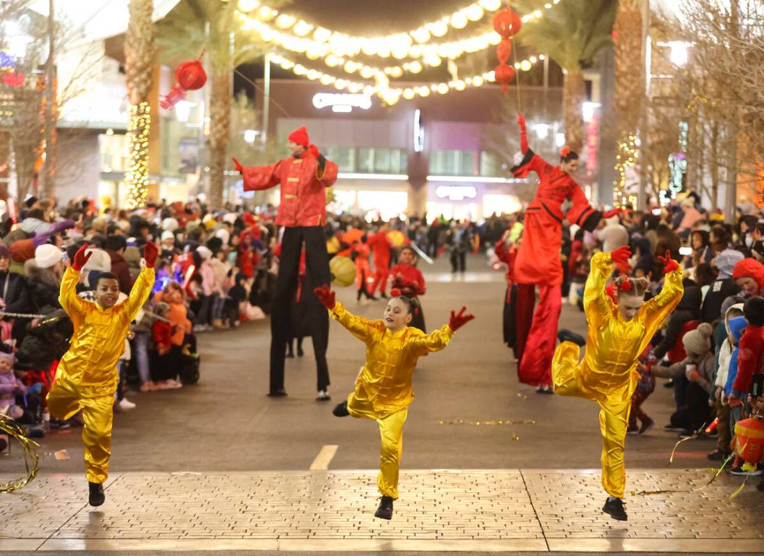 Best Agency performers entertain the crowd during Downtown Summerlin's Lunar New Year Parade on ...