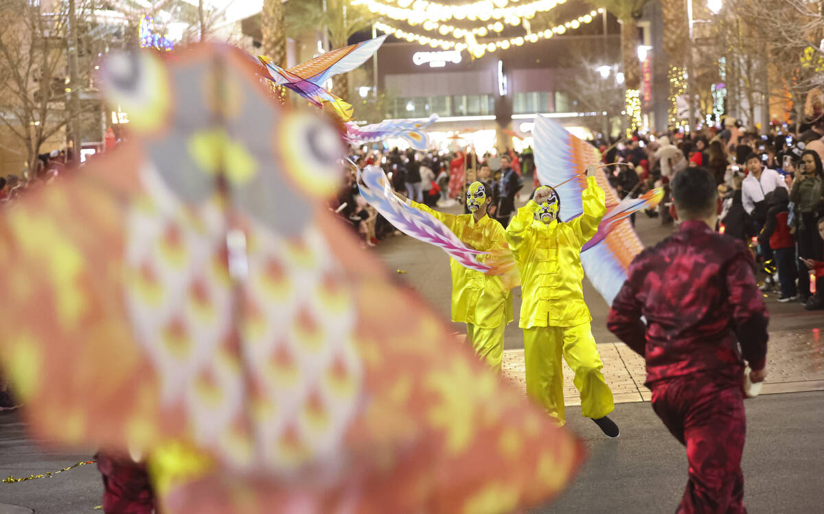 Best Agency performers entertain the crowd during Downtown Summerlin's Lunar New Year Parade on ...