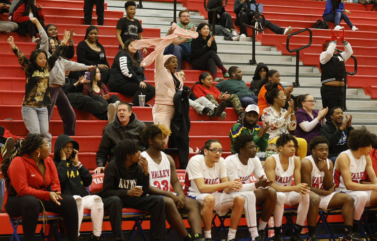 Valley High School’s fans cheer during the second half of a basketball game against Dese ...