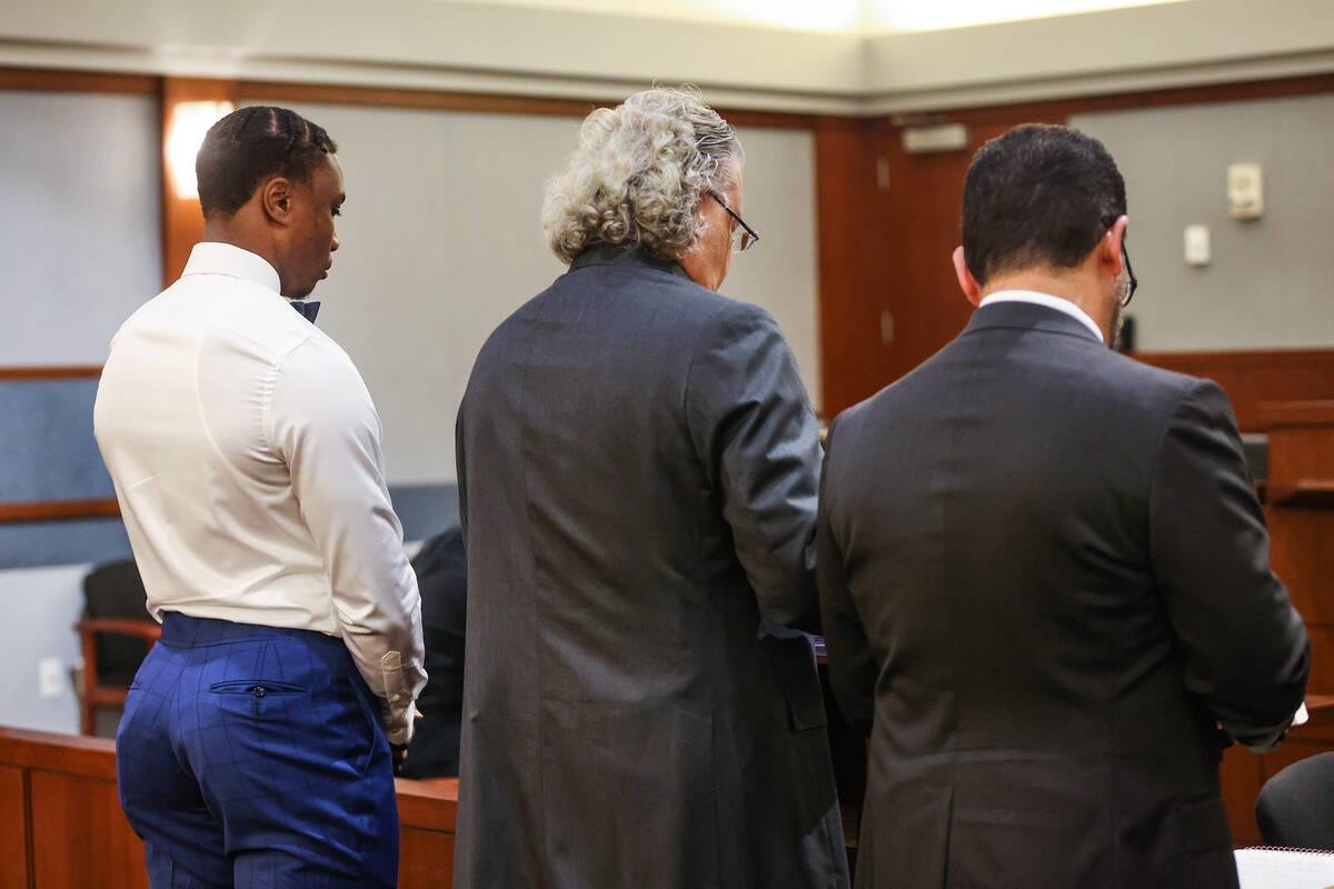 Ex-Raiders wide receiver Henry Ruggs, left, appears at a hearing next to attorney David Chesnof ...