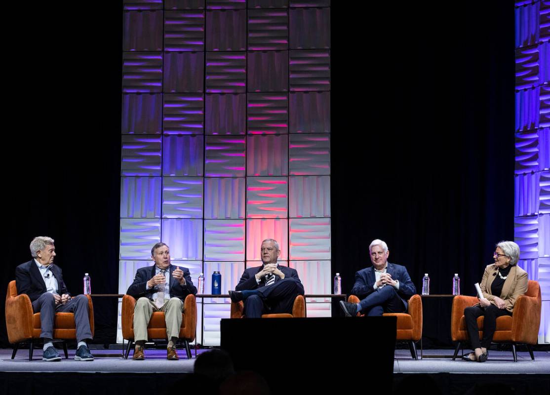 Tom Buschatzke, director of the Arizona Department of Water Resources, second left, speaks as S ...