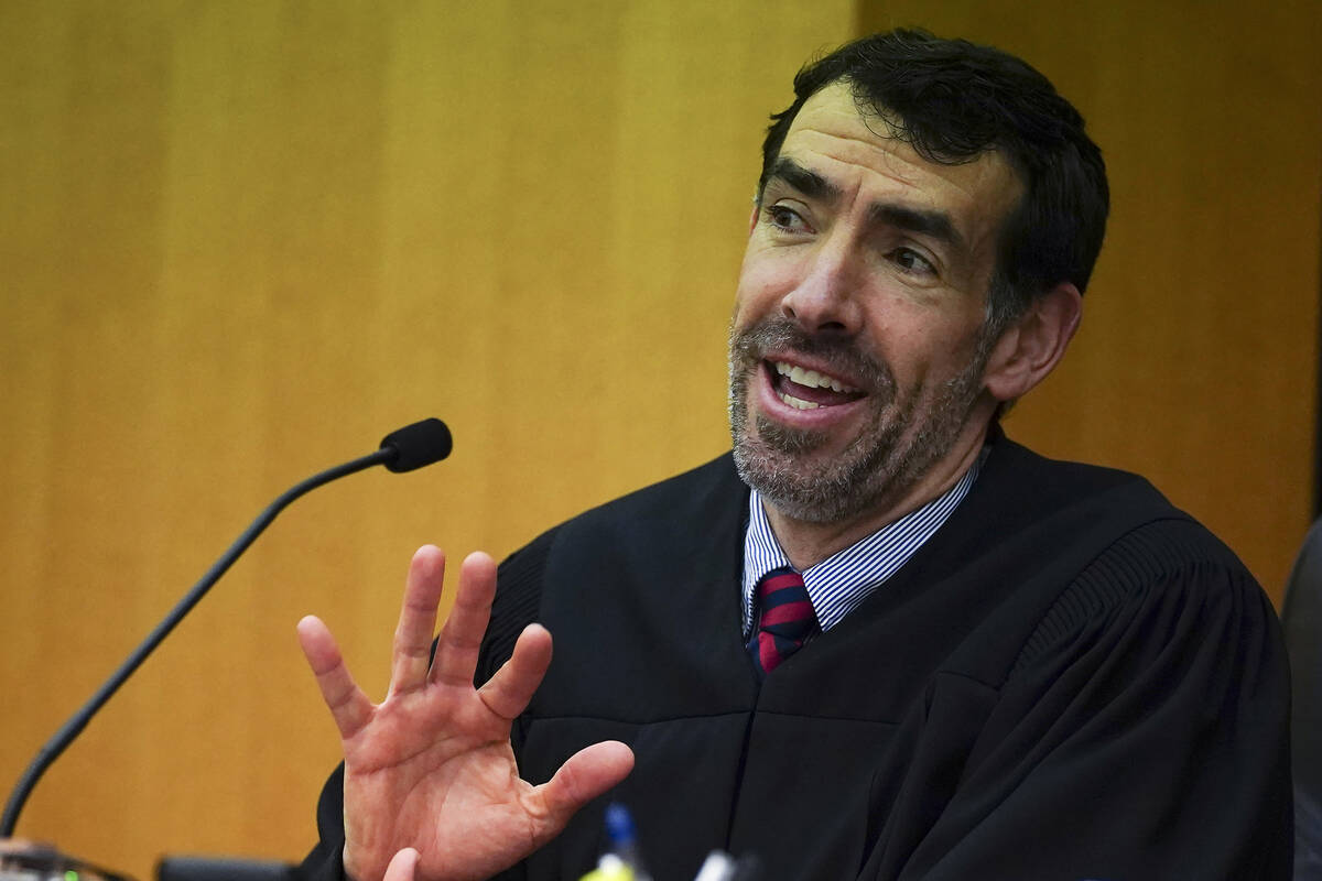 Fulton County Superior Court Judge Robert McBurney speaks during a hearing to decide if the fin ...