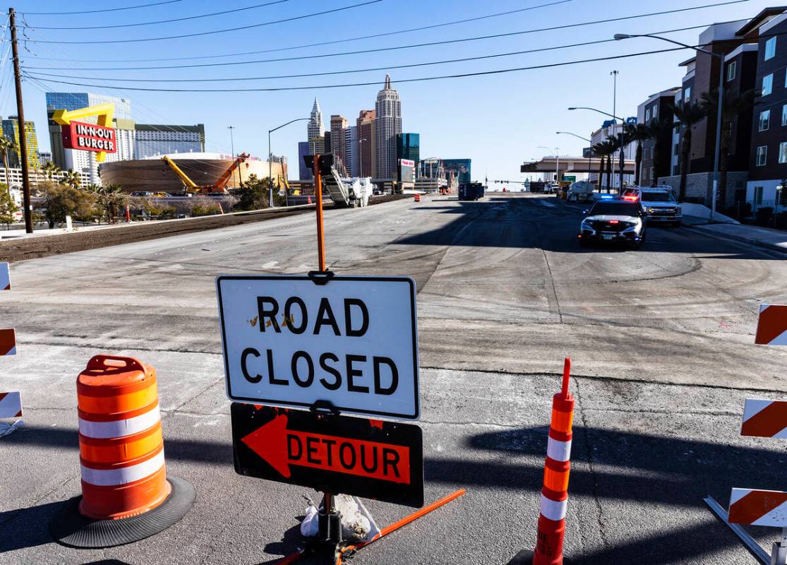 Road Closed and Detour signs are posted at the intersection of Tropicana Avenue and Dean Martin ...