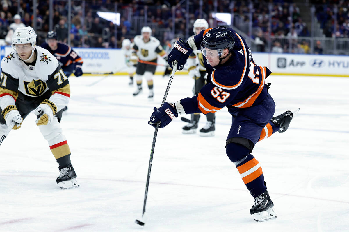 New York Islanders center Casey Cizikas (53) shoots past Vegas Golden Knights center William Ka ...