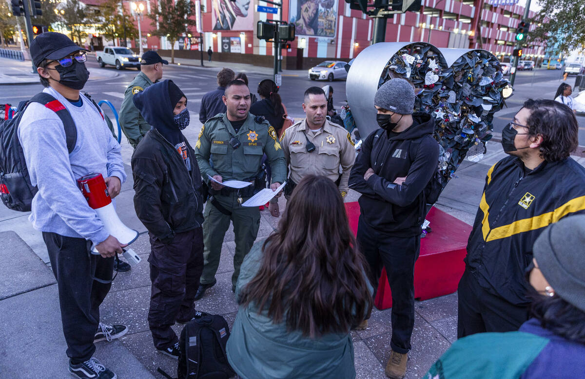 Metro officers make contact with those assembling to rally for Tyre Nichols organized by Red D ...